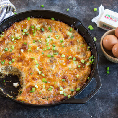 This Cauliflower Breakfast Skillet Casserole is protein packed thanks to chicken sausage, eggs and cheese. LOVE this savory lower carb breakfast-- I'm looking at you cauliflower! Meal prep at the beginning of the week and store slices in airtight containers for a convenient breakfast on the go!