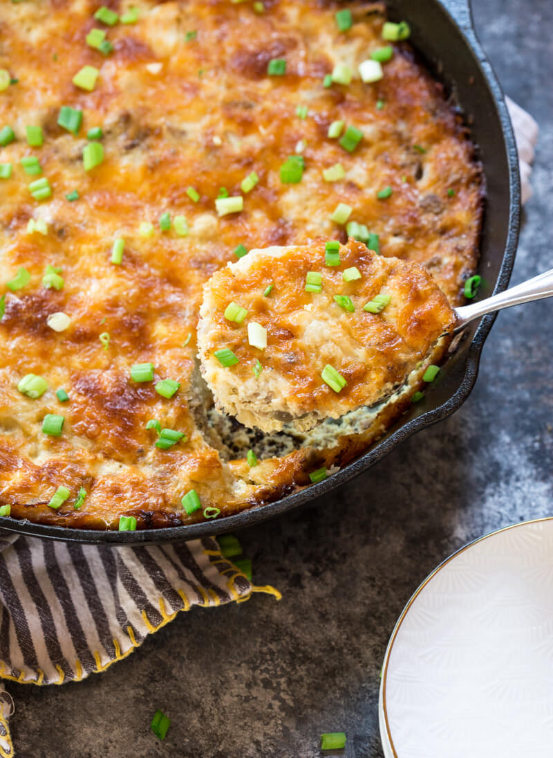 This Cauliflower Breakfast Skillet Casserole is protein packed thanks to chicken sausage, eggs and Cabot cheese. LOVE this savory lower carb breakfast-- I'm looking at you cauliflower! Meal prep this recipe at the beginning of the week and store slices in airtight containers for a convenient breakfast on the go! 