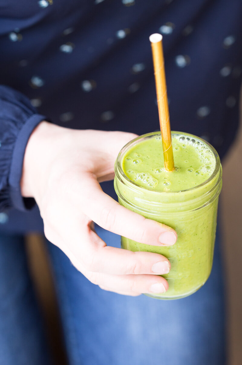 Go green with this mighty Matcha Green Tea Smoothie made with frozen mango, peaches, kale, orange juice, kefir, and matcha green tea powder. It's antioxidant rich, smooth and creamy and makes a great breakfast or snack!