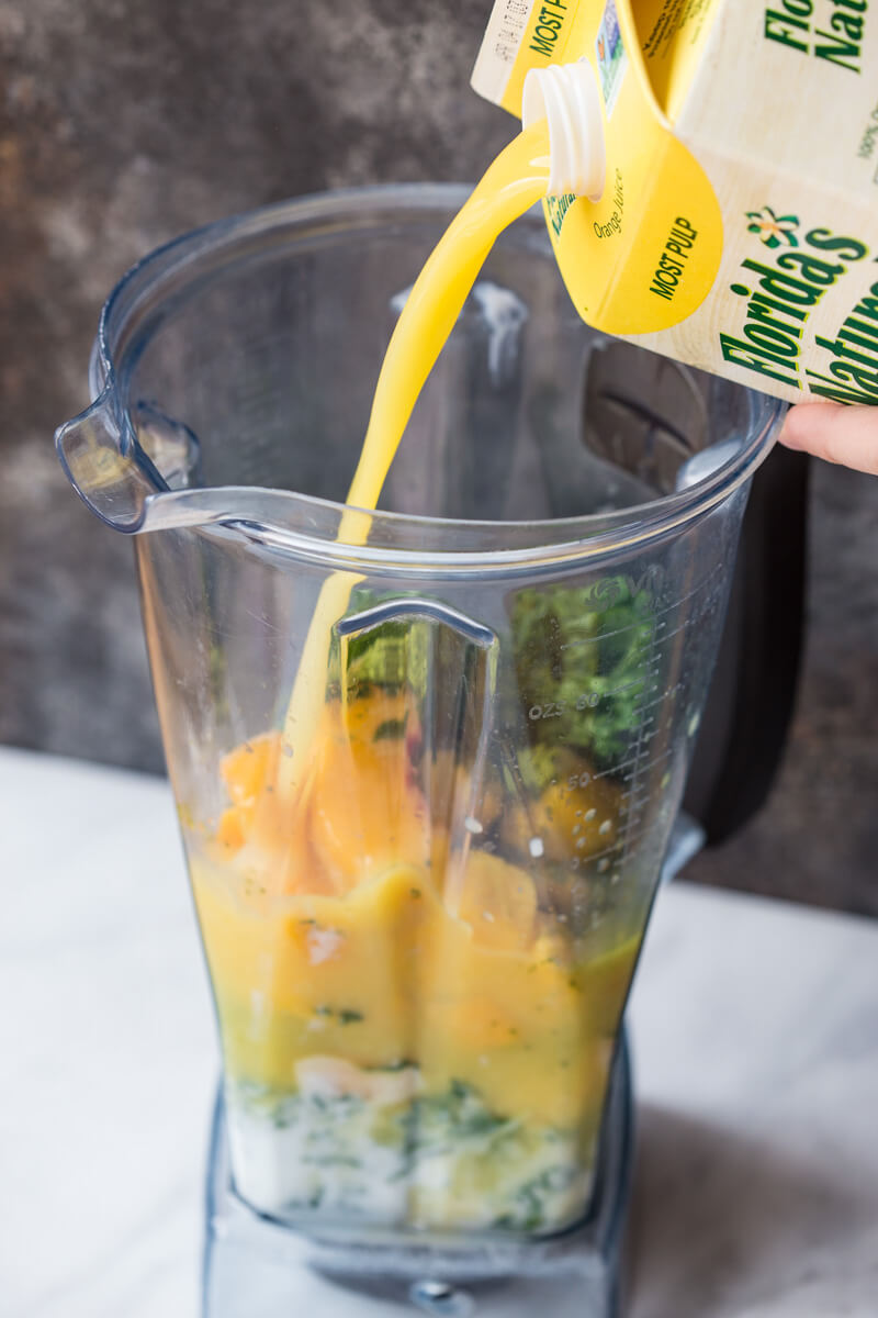 Go green with this mighty Matcha Green Tea Smoothie made with frozen mango, peaches, kale, orange juice, kefir, and matcha green tea powder. It's antioxidant rich, smooth and creamy and makes a great breakfast or snack!