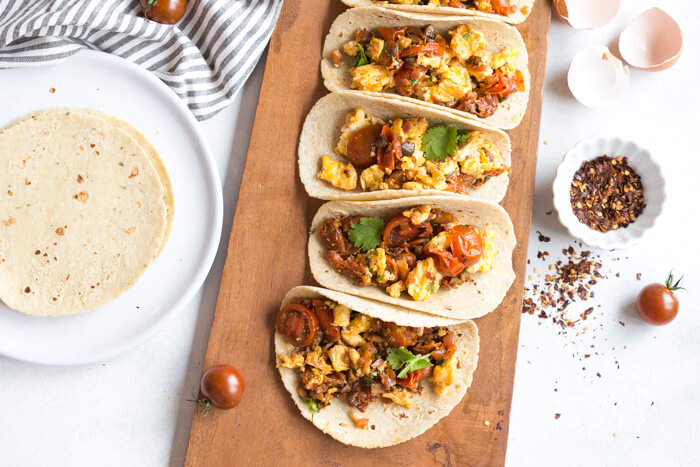 Get excited because these Skillet Breakfast Tacos with Chorizo and Tomatoes are da bomb dot com. Like literally flavor explosion in every bite. This recipe is one of those can’t stop, won’t stop type of breakfast recipes. Seconds? Yes, please!