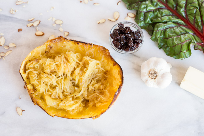 All the things you need on a busy weeknight... garlic butter chicken spaghetti squash skillet with kale, tart cherries, and cheese baked in the cast iron. 