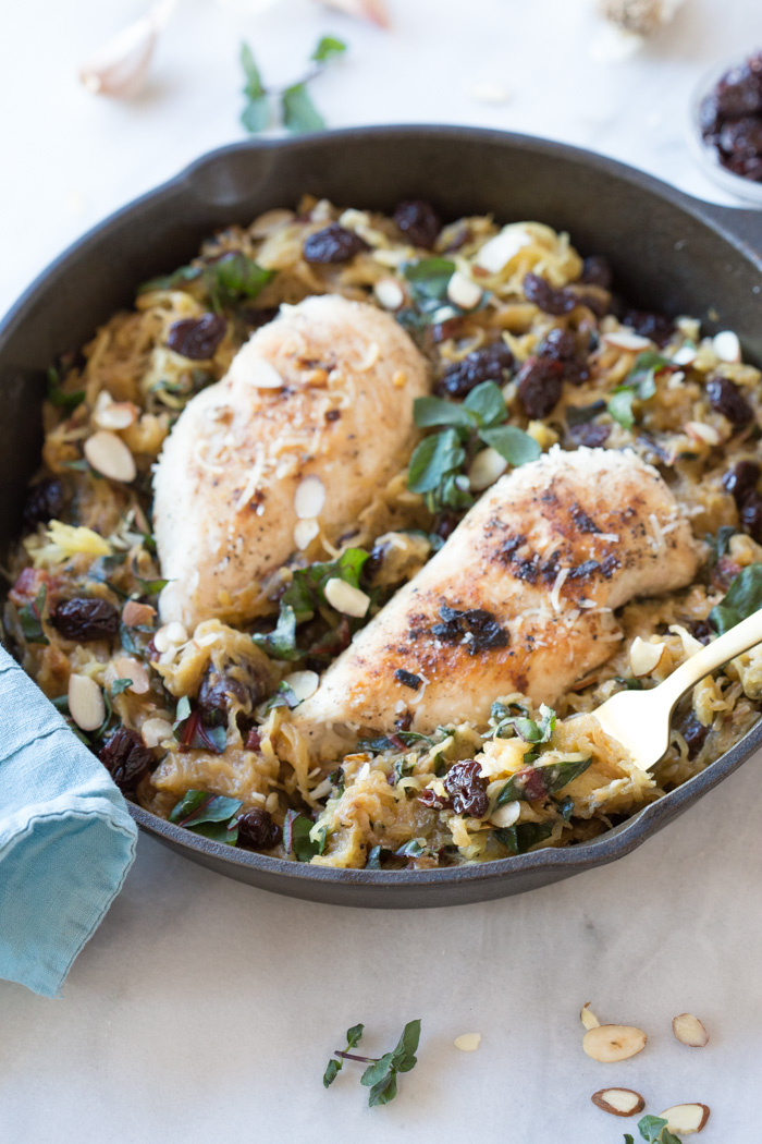 All the things you need on a busy weeknight... garlic butter chicken spaghetti squash skillet with kale, tart cherries, and cheese baked in the cast iron. 