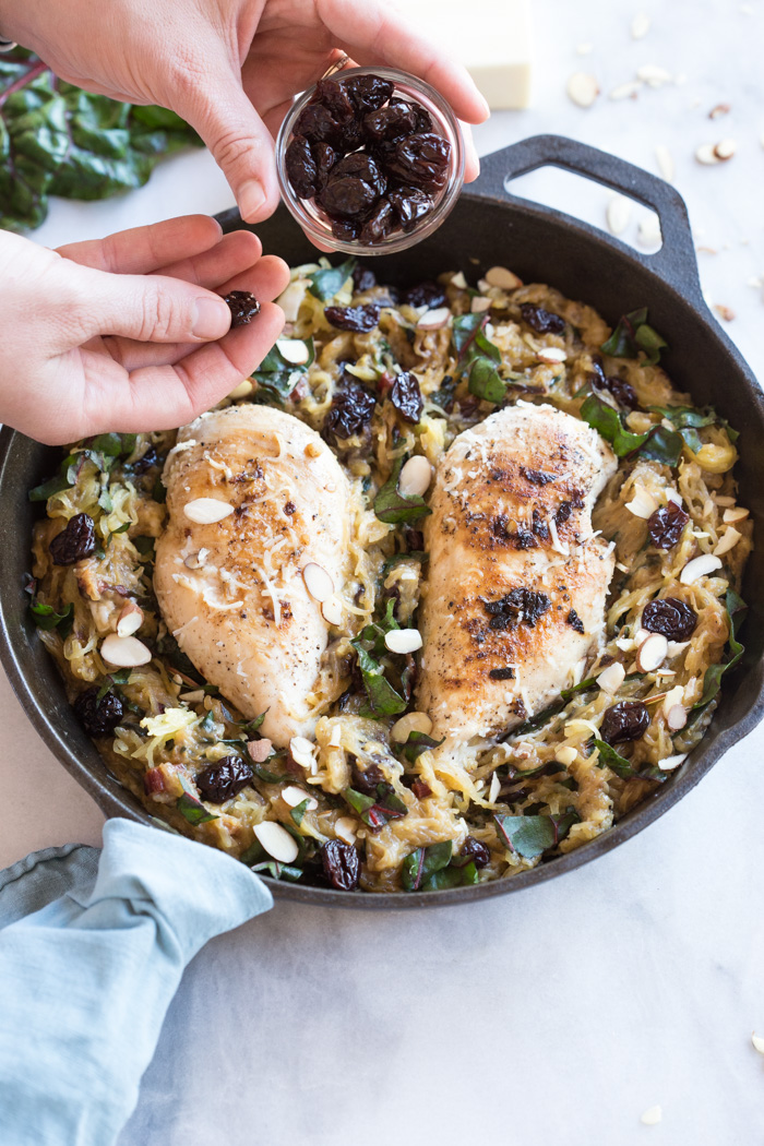 All the things you need on a busy weeknight... garlic butter chicken spaghetti squash skillet with kale, tart cherries, and cheese baked in the cast iron. 