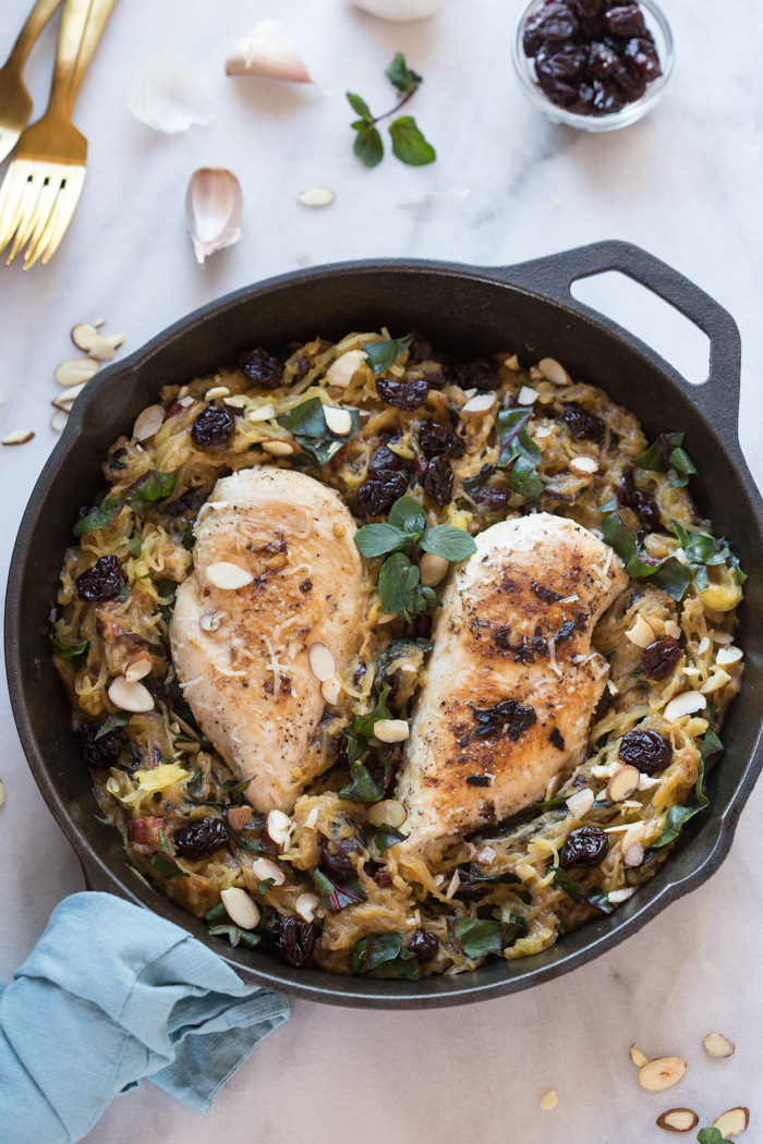 All the things you need on a busy weeknight... garlic butter chicken spaghetti squash skillet with kale, tart cherries, and cheese baked in the cast iron. 