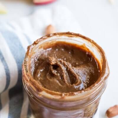 Homemade Chocolate Peanut Butter.... that's actually good for you and made with no added sugar. If you've ever wondered if you can make peanut butter at home, get excited because the answer is YES!! And chocolate is involved.