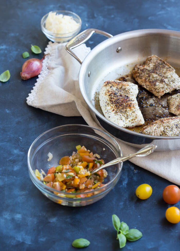 Italian herbed browned turkey breast served bruschetta-style sans bread with fresh basil, heirloom tomatoes, and a drizzle of tangy balsamic. Skillet Italian Herb Bruschetta Turkey is easy to cook and has so much flavor!