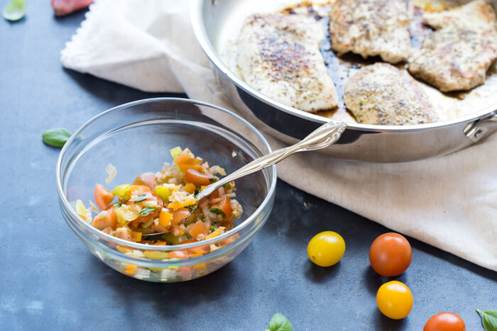 Italian herbed browned turkey breast served bruschetta-style sans bread with fresh basil, heirloom tomatoes, and a drizzle of tangy balsamic. Skillet Italian Herb Bruschetta Turkey is easy to cook and has so much flavor!