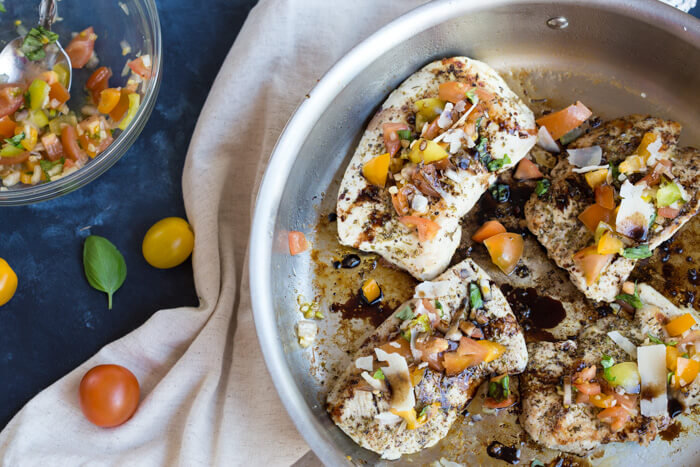 Italian herbed browned turkey breast served bruschetta-style sans bread with fresh basil, heirloom tomatoes, and a drizzle of tangy balsamic. Skillet Italian Herb Bruschetta Turkey is easy to cook and has so much flavor!