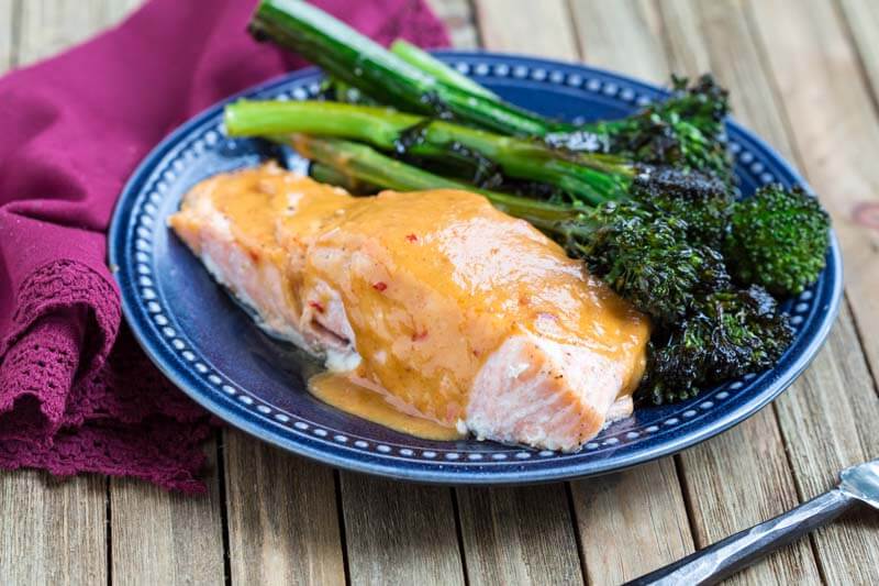 Easy Baked Salmon with Spicy Peanut Butter Glaze-- a zesty, citrusy, peanut butter glaze that takes salmon to the next level.