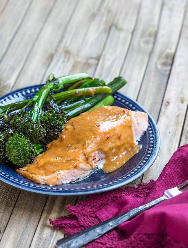 Easy Baked Salmon with Spicy Peanut Butter Glaze-- a zesty, citrusy, peanut butter glaze that takes salmon to the next level. 