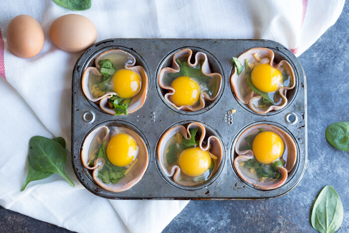 Ham Spinach Egg Cups are an easy meal prep that is high in protein and low carb. Simply bake in a muffin tin to have a healthy breakfast at the ready... made with only 4 ingredients! 