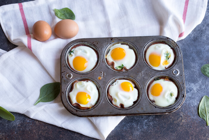 Ham Spinach Egg Cups are an easy meal prep that is high in protein and low carb. Simply bake in a muffin tin to have a healthy breakfast at the ready... made with only 4 ingredients! 