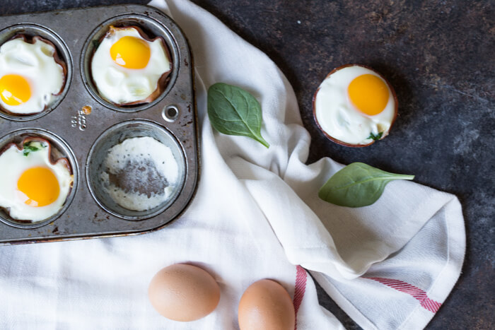 Ham Spinach Egg Cups are an easy meal prep that is high in protein and low carb. Simply bake in a muffin tin to have a healthy breakfast at the ready... made with only 4 ingredients! 