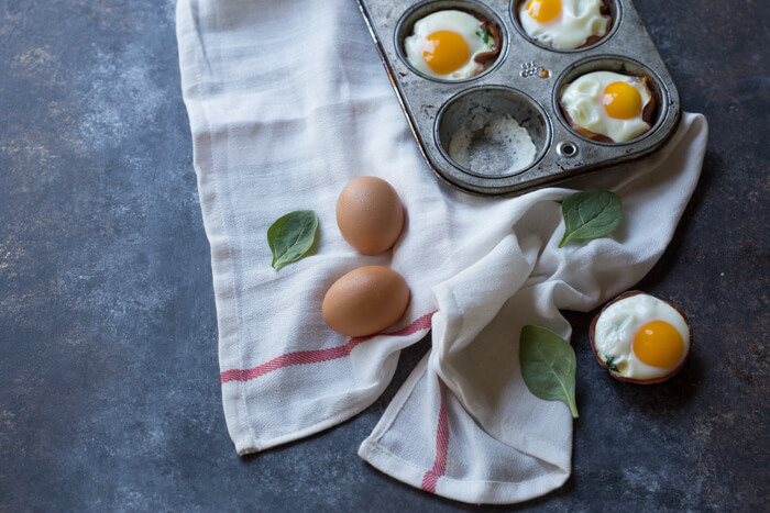 Ham Spinach Egg Cups are an easy meal prep that is high in protein and low carb. Simply bake in a muffin tin to have a healthy breakfast at the ready... made with only 4 ingredients! 