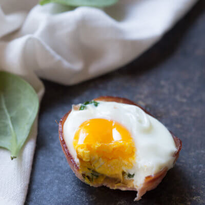 Ham Spinach Egg Cups are an easy meal prep that is high in protein and low carb. Simply bake in a muffin tin to have a healthy breakfast at the ready... made with only 4 ingredients!