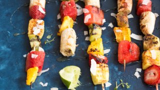 Add a punch of color to the barbecue with these Honey Lime Grilled Fruit Skewers. Tangy, sweet and hydrating on a hot summer day!