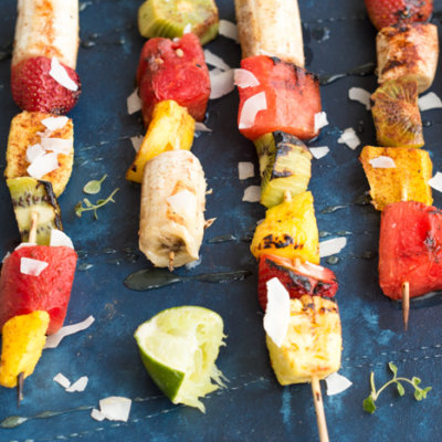 Add a punch of color to the barbecue with these Honey Lime Grilled Fruit Skewers. Tangy, sweet and hydrating on a hot summer day!