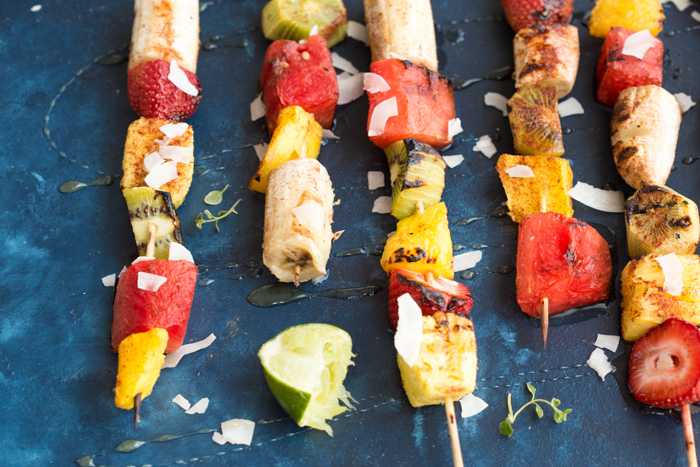 Add a punch of color to the barbecue with these Honey Lime Grilled Fruit Skewers. Tangy, sweet and hydrating on a hot summer day!