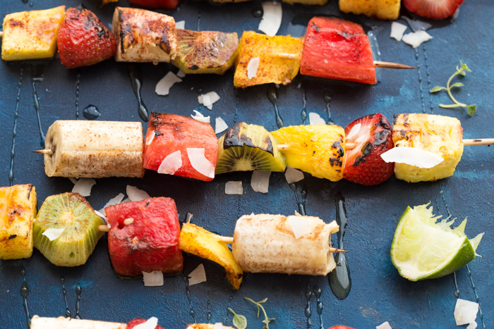 Add a punch of color to the barbecue with these Honey Lime Grilled Fruit Skewers. Tangy, sweet and hydrating on a hot summer day!