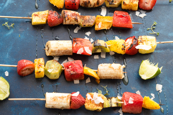 Add a punch of color to the barbecue with these Honey Lime Grilled Fruit Skewers. Tangy, sweet and hydrating on a hot summer day!