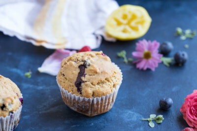 These Lemon Berry Breakfast Muffins are made with whole wheat flour, coconut oil, lemons, blueberries and raspberries and they make a wholesome snack or breakfast!