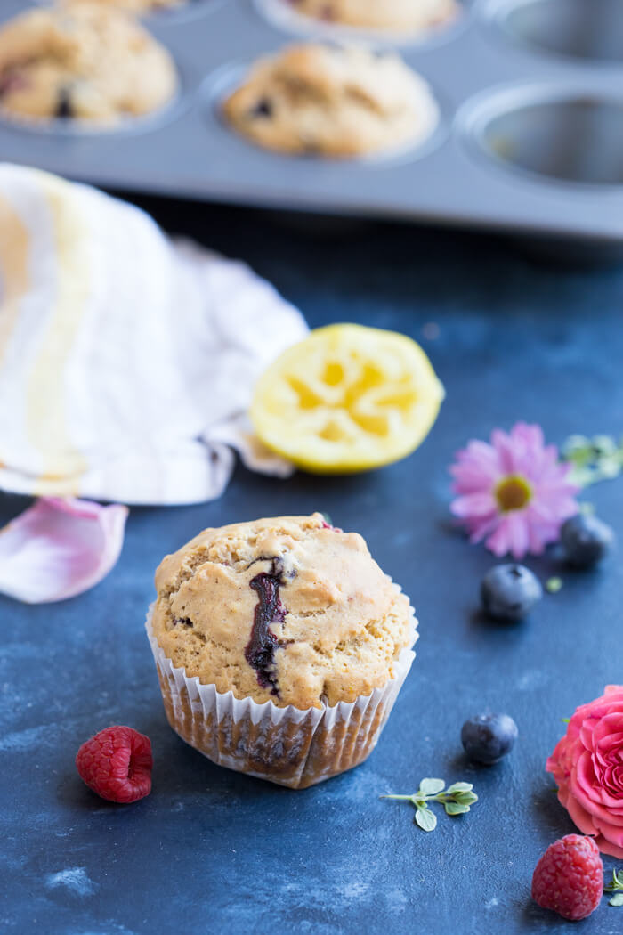 These Lemon Berry Breakfast Muffins are made with whole wheat flour, coconut oil, lemons, blueberries and raspberries and they make a wholesome snack or breakfast!
