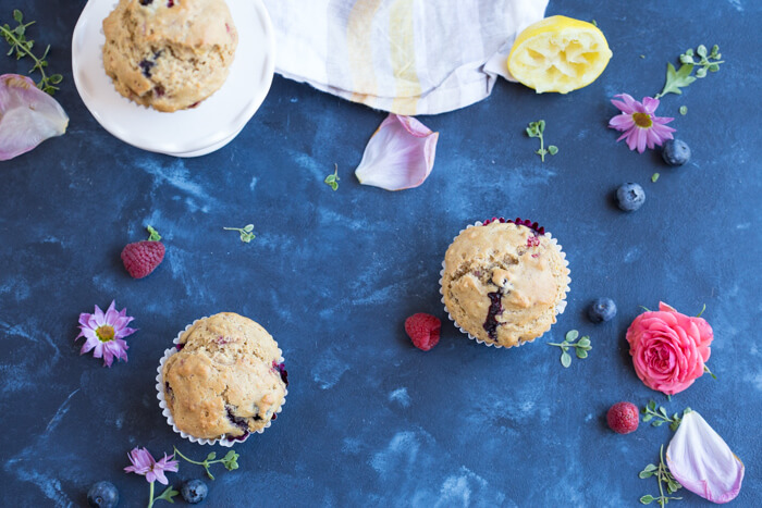 These Lemon Berry Breakfast Muffins are made with whole wheat flour, coconut oil, lemons, blueberries and raspberries and they make a wholesome snack or breakfast!