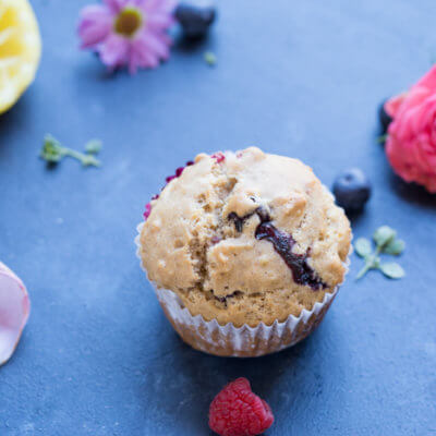 These Lemon Berry Breakfast Muffins are made with whole wheat flour, coconut oil, lemons, blueberries and raspberries and they make a wholesome snack or breakfast!