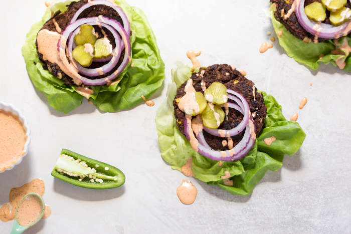 Skillet Jalapeño Black Bean Burgers... the cast iron skillet is the game changer for cooking black bean burgers especially if you're vegetarian or vegan because skillet = perfect for the grill!