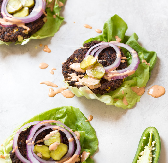 Skillet Jalapeño Black Bean Burgers... the cast iron skillet is the game changer for cooking black bean burgers especially if you're vegetarian or vegan because skillet = perfect for the grill!