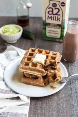 Chocolate Milk Zucchini Waffles... chocolate milk waffles with hidden veggies you can't taste, your next breakfast obsession awaits.