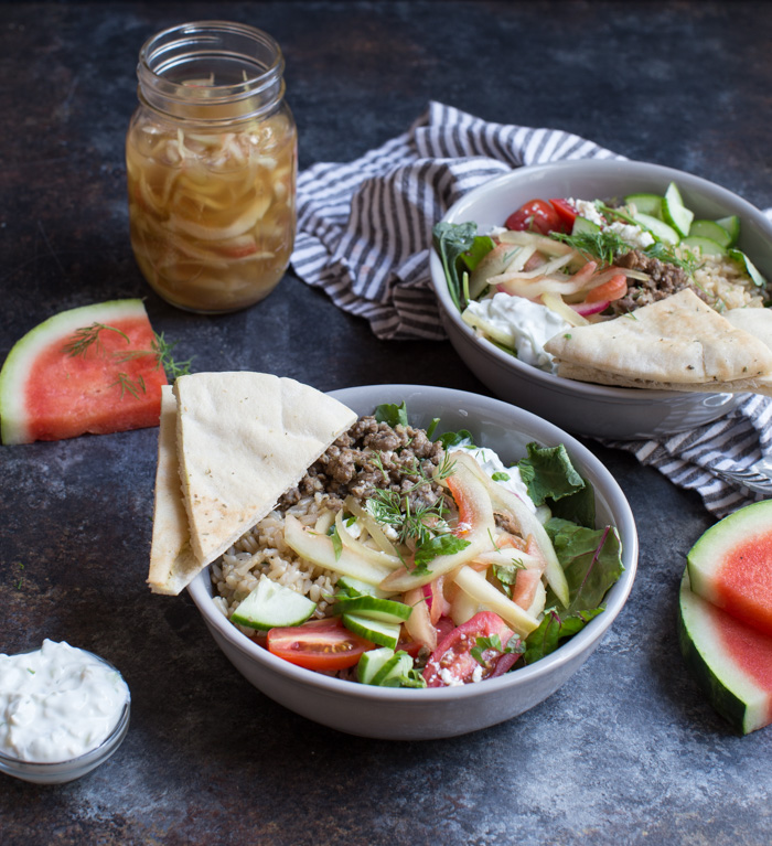 Gyro Salad Bowls with Pickled Watermelon Rind are what you make when you’re living life to the fullest. Instead of tossing your watermelon rind, pickle it and make gyro salad bowls!