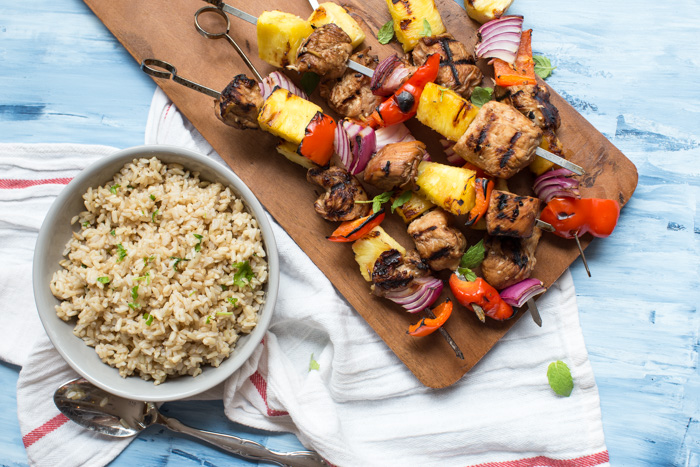 Hawaiian Turkey Kabobs are sweet, hearty and protein packed. Skewer pineapple, red pepper, red onion, and marinated turkey breast to toss on the grill for a casual meal any day of the week.