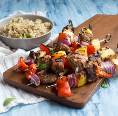 Hawaiian Turkey Kabobs are sweet, hearty and protein packed. Skewer pineapple, red pepper, red onion, and marinated turkey breast to toss on the grill for a casual meal any day of the week.