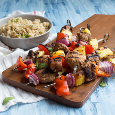 Hawaiian Turkey Kabobs are sweet, hearty and protein packed. Skewer pineapple, red pepper, red onion, and marinated turkey breast to toss on the grill for a casual meal any day of the week.