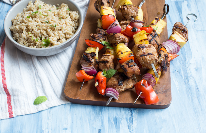Hawaiian Turkey Kabobs are sweet, hearty and protein packed. Skewer pineapple, red pepper, red onion, and marinated turkey breast to toss on the grill for a casual meal any day of the week.