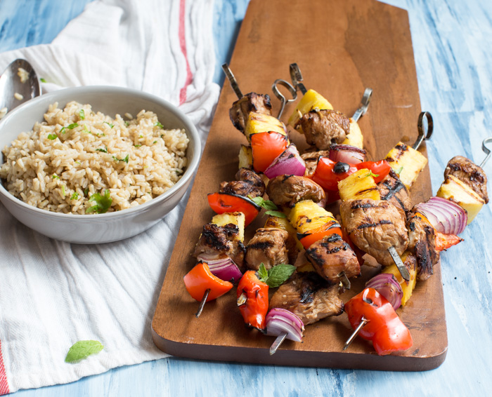 Hawaiian Turkey Kabobs are sweet, hearty and protein packed. Skewer pineapple, red pepper, red onion, and marinated turkey breast to toss on the grill for a casual meal any day of the week.