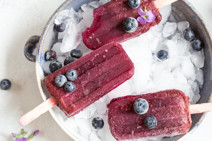 If you’re looking for more YUMMY ways to sneak in a little extra veg into your (or the fam’s) diet, look no further than making a batch (or all 4) of these savory fruit and veggie popsicles.