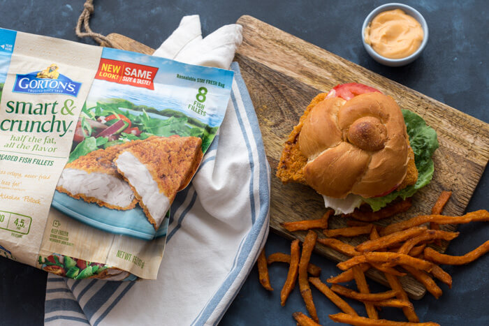 Want to bring home restaurant style flavor and have it on the table in less than 25 minutes? Get this Crispy Fish Sandwich with Sriracha Mayo Dressing on the menu!