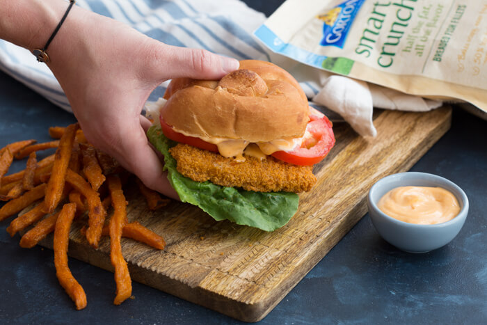 Want to bring home restaurant style flavor and have it on the table in less than 25 minutes? Get this Crispy Fish Sandwich with Sriracha Mayo Dressing on the menu!