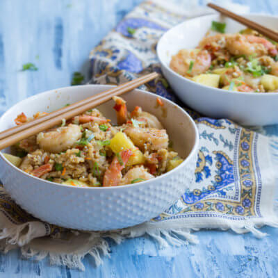 This Shrimp Cauliflower Rried Rice is ready in just 25 minutes! This is the perfect dish for a quick, need it in a hurry Monday through Friday meal or just as a healthier alternative to the standard cozy “take out and a movie” meal.