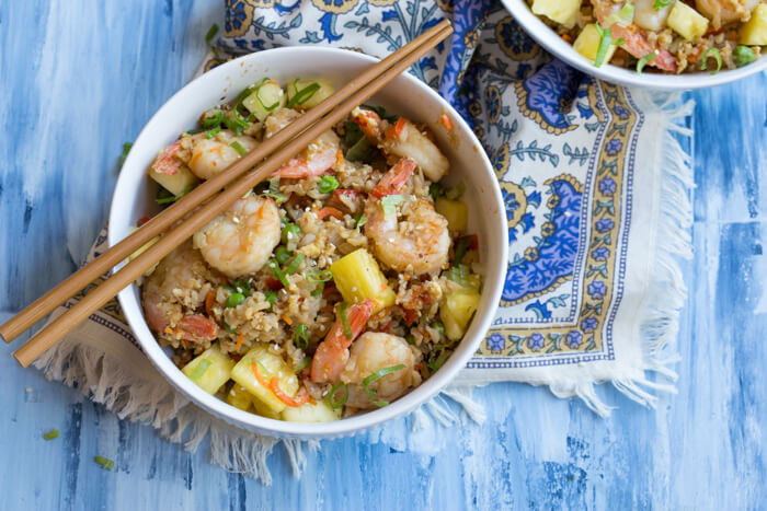 This Shrimp Cauliflower Fried Rice is ready in just 25 minutes! This is the perfect dish for a quick, need it in a hurry Monday through Friday meal or just as a healthier alternative to the standard cozy “take out and a movie” meal.