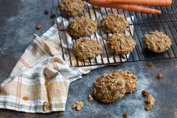 These Carrot Cake Breakfast Cookies are made with sweet carrots, oats, whole wheat flour, maple syrup, golden raisins and walnuts. Love all the healthy fats, whole grains, and veggies in these cookies! 