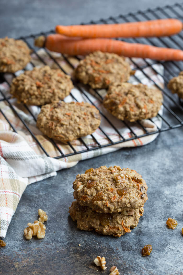 These Carrot Cake Breakfast Cookies are made with sweet carrots, oats, whole wheat flour, maple syrup, golden raisins and walnuts. Love all the healthy fats, whole grains, and veggies in these cookies! 