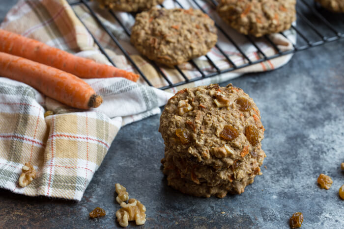 These Carrot Cake Breakfast Cookies are made with sweet carrots, oats, whole wheat flour, maple syrup, golden raisins and walnuts. Love all the healthy fats, whole grains, and veggies in these cookies! 