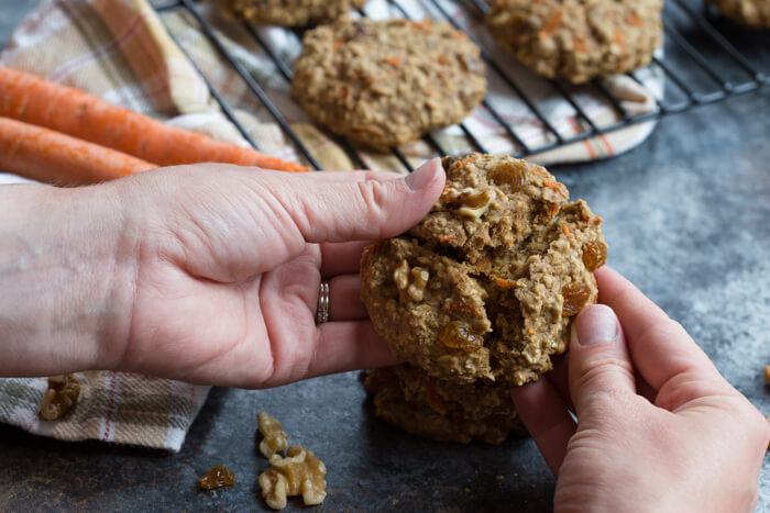 These Carrot Cake Breakfast Cookies are made with sweet carrots, oats, whole wheat flour, maple syrup, golden raisins and walnuts. Love all the healthy fats, whole grains, and veggies in these cookies! 