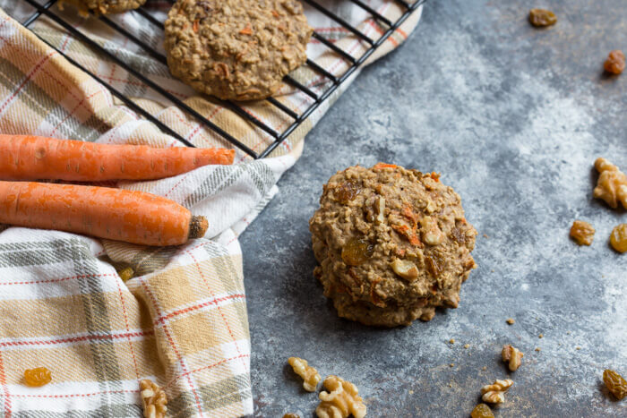 These Carrot Cake Breakfast Cookies are made with sweet carrots, oats, whole wheat flour, maple syrup, golden raisins and walnuts. Love all the healthy fats, whole grains, and veggies in these cookies! 