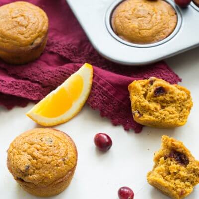 These gluten free Pumpkin Cranberry Orange Muffins are what I like to call "Morning Glory". They are an early morning, warm cup of chai tea with a splash of eggnog, and a cozy-blanket-snuggle-on-the-sofa type of muffins.