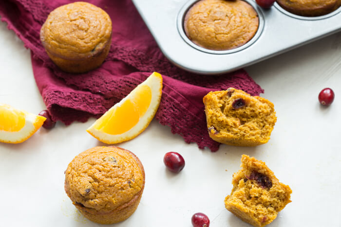 These gluten free Pumpkin Cranberry Orange Muffins are what I like to call "Morning Glory". They are an early morning, warm cup of chai tea with a splash of eggnog, and a cozy-blanket-snuggle-on-the-sofa type of muffins.